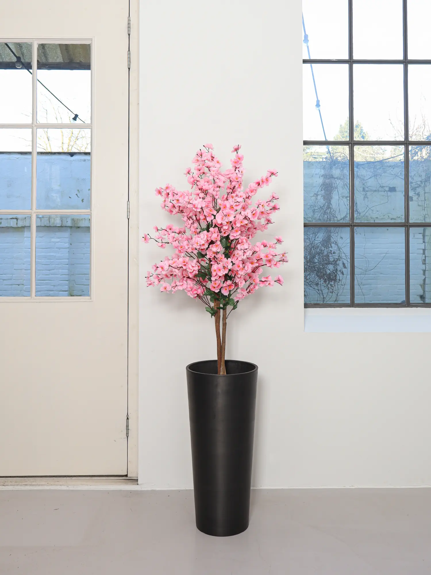 Kleine roze kunst kersenbloesem 120cm – decoratieve blikvanger met volle bloesemtakken.